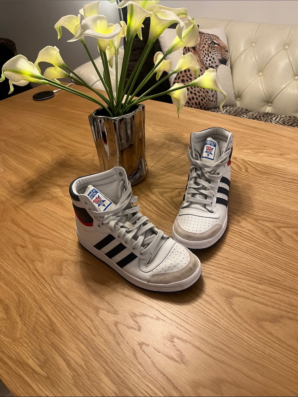adidas White High-Top Sneakers with Blue Stripes and Red Heel Accent